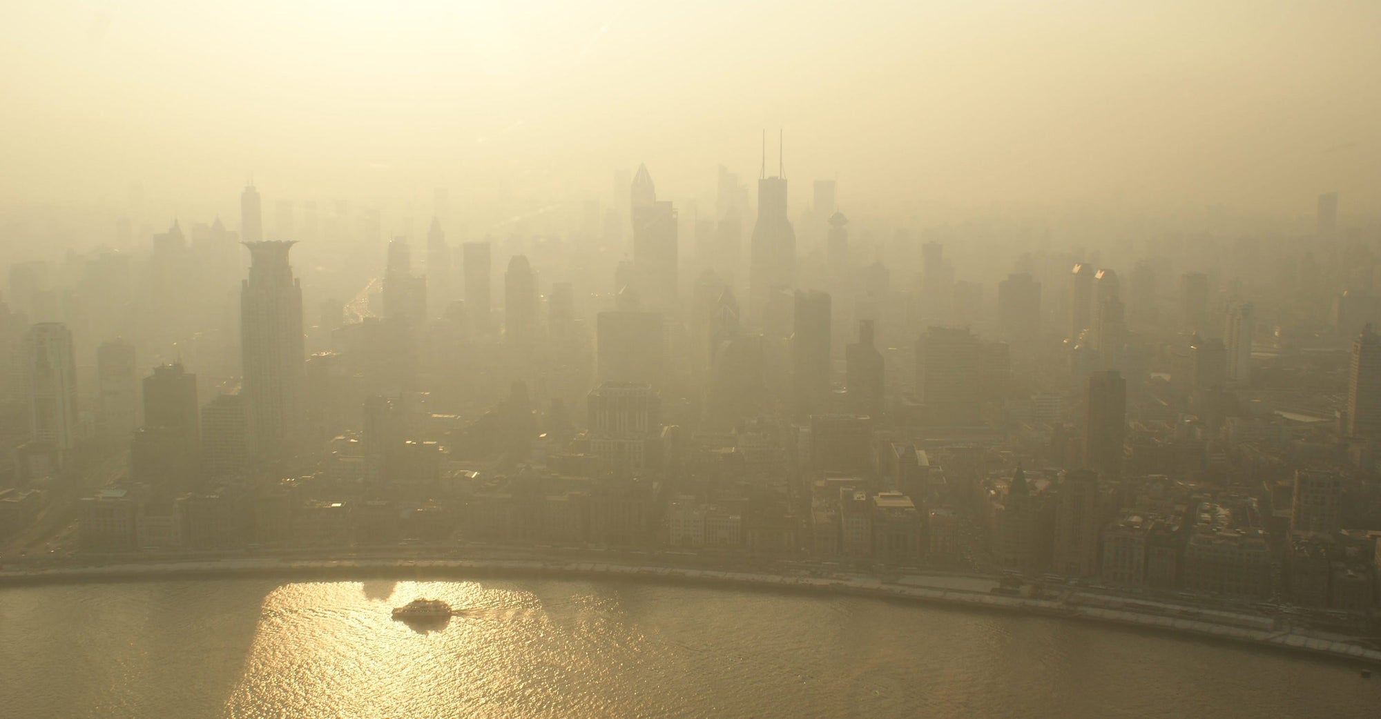 Hazy skies over city landscape